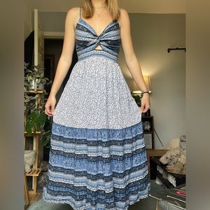 Blue dress never worn. I am 5’9 and it hits mid shin. Size S